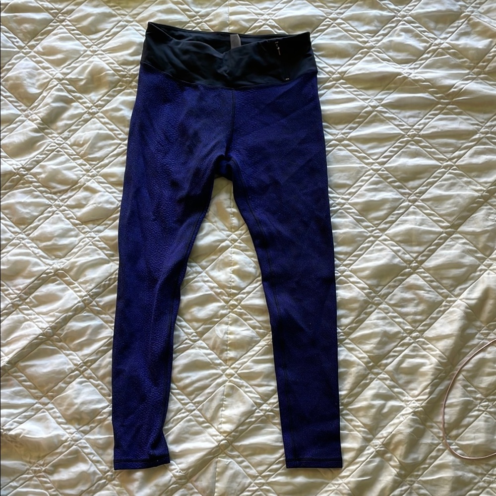 Woman’s purple/black Leggings